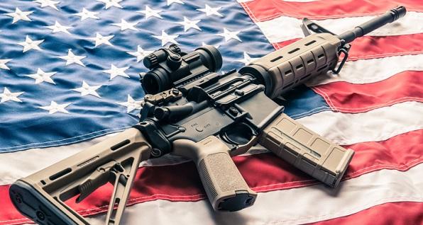 AR-15 on top of American flag