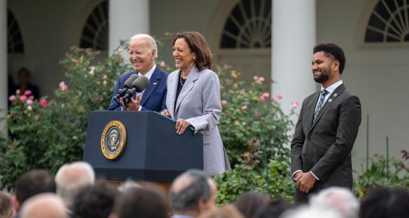 President Joe Biden stands next to Vice President Kamala Harris at the White House Rose Garden during a speech announcing a new Office of Gun Violence Prevention. At right is U.S. Rep. Maxwell Frost, D-Florida.