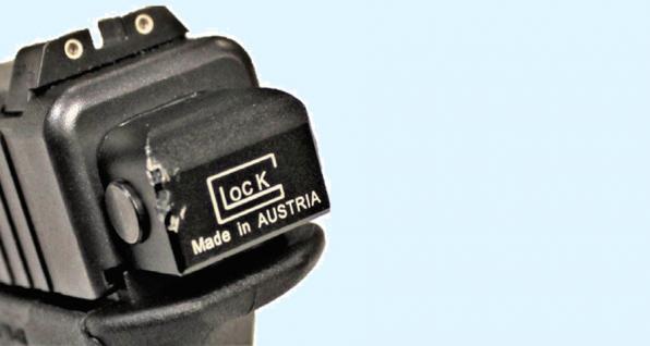 Conversion switch with counterfeit Glock logo.
